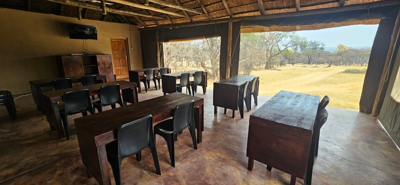Open-sided classroom with desks looking out over the Seringa bush
